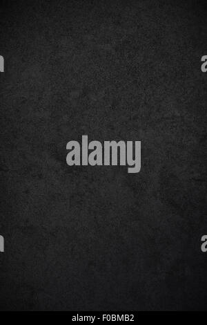 Grungy black concrete wall background Stock Photo