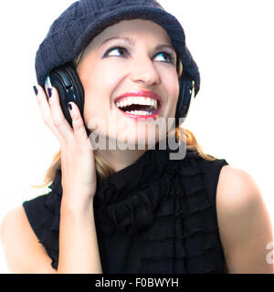 Blonde lady listening to the music. Stock Photo