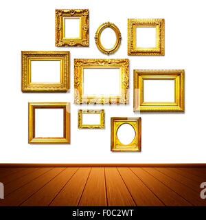 Antique golden frames on the wall. Art gallery. Objects group on white background Stock Photo