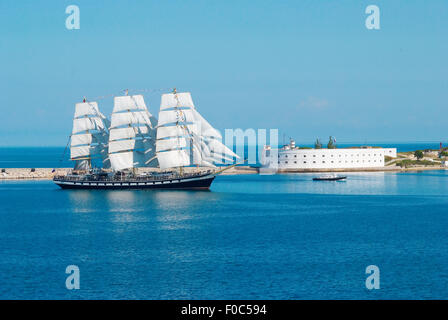 Sailing ship entering to the bay. Crimea, Ukraine Stock Photo