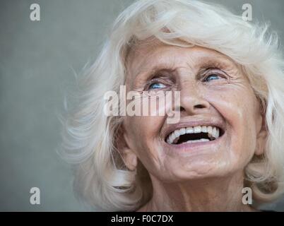Portrait of senior adult woman, laughing Stock Photo