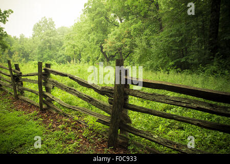 Pretty rural wood fence in countryside Stock Photo