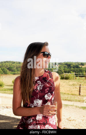 Beautiful young woman at the Picnic evening at Loubejac which is a small commune or village in the Dordogne region of France Stock Photo
