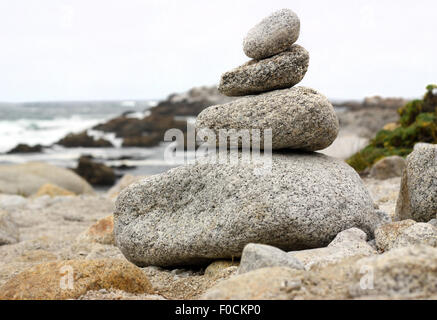 Stack of rocks by the ocean Stock Photo