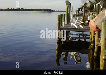 Boat dock on the Halifax River, Ormond Beach, Florida Stock Photo