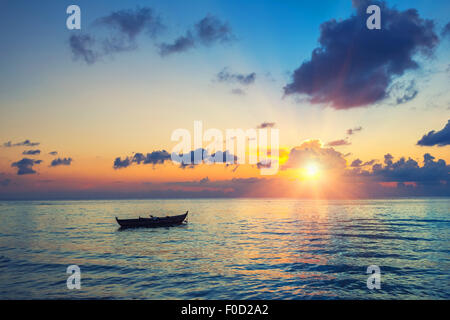 Sunrise over ocean Stock Photo