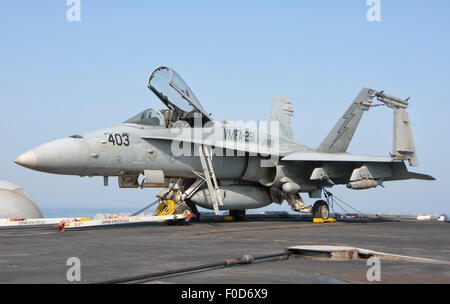 An F/A-18C Hornet assigned to The Thunderbolts of Marine Strike Fighter Squadron 251 (VMFA-251), embarked aboard the aircraft ca Stock Photo