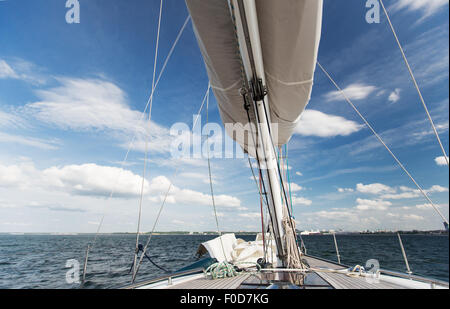 close up of sailboat mast or yacht sailing on sea Stock Photo
