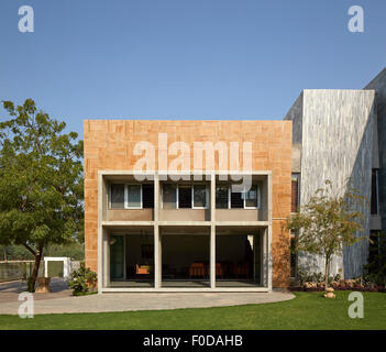 Garden view towards sitting room area. Marbled House, Ahmedabad, India. Architect: Matharoo Associates, 2015. Stock Photo