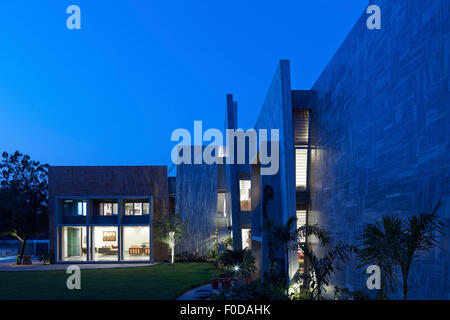 Overall view dusk. Marbled House, Ahmedabad, India. Architect: Matharoo Associates, 2015. Stock Photo