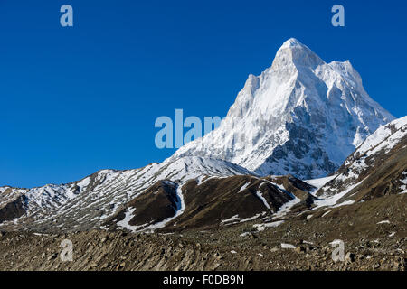 The mountain Shivling, with 6543m the highest natural Shiva-Lingam, thrones above Gaumukh, Gangotri, Uttarakhand, India Stock Photo