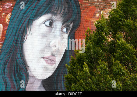 A large portrait of a woman created by Argentinian artist Martin Ron Murales as part of Upfest 2015 Stock Photo