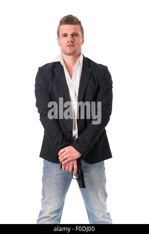 Elegant man with gun, dressed as a spy or secret agent, with earphones, isolated on white Stock Photo