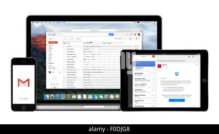 Varna, Bulgaria - February 02, 2015: Google Gmail app on Apple iPhone iPad displays and desktop version of Gmail on Macbook Pro Stock Photo