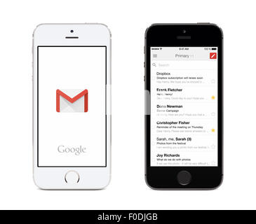 Varna, Bulgaria - May 26, 2015: Google Gmail app logo and Gmail inbox on the front view white and black Apple iPhones. Stock Photo