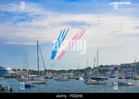Red Arrows Flying into Falmouth in Cornwall August 2015 Stock Photo