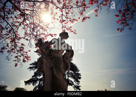 Statue in the park at sunny autumn day Stock Photo