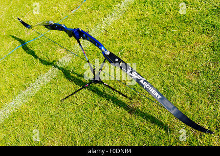 Recurve archery bow close-up resting on stand during competition Stock Photo