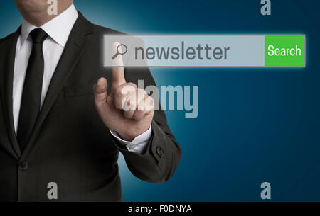 Newsletter internet browser is operated by businessman. Stock Photo