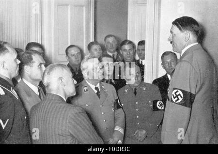 Hitler, Adolf, 20.4.1889 - 30.4.1945, German politician (NSDAP), Chancellor of the Reich 30.1.1933 - 30.4.1945, with the staff of the Chancellery of the Reich on the evening of the Reichstag Election, 29.3.1936, Stock Photo