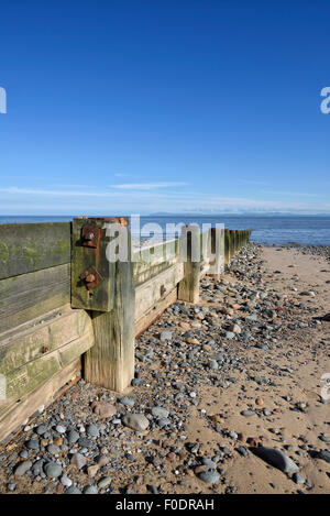 Wooden breakwater on the beach in Fleetwood, Lancashire, UK Stock Photo