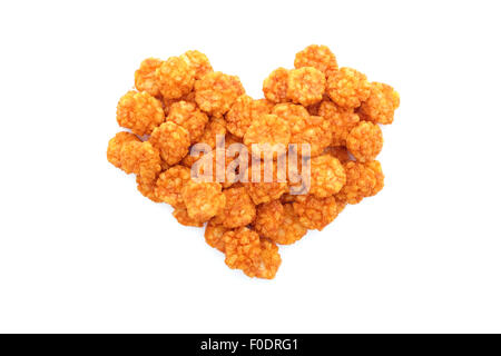 Chilli rice crackers in a heart shape, isolated on a white background Stock Photo