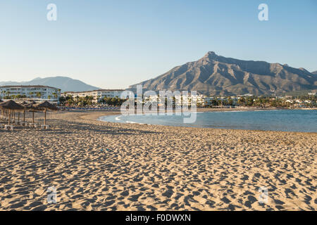 Empty Bay and beach of Puerto Banus in Marbella with La Concha mountain in background. Andalusia, Spain. Stock Photo