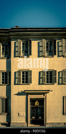 Traditional Italian building with shuttered windows. Milan, Italy. Stock Photo