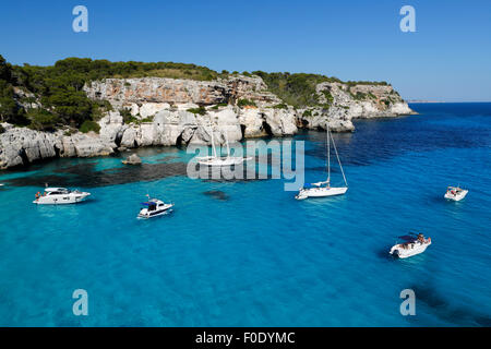 Yachts anchored in cove, Cala Macarella, near Cala Galdana, South West Coast, Menorca, Balearic Islands, Spain, Europe Stock Photo