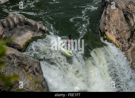 Scenes of two kayakers navigating the chutes at Great Falls National Park, Great Falls, Virginia Stock Photo