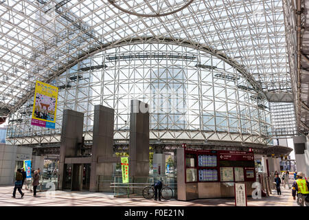 Japan, Kanazawa.station. Daytime interior view of the metal framed glass Motenashi dome atrium in front of the main station entrance. Stock Photo
