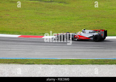 SEPANG, MALAYSIA - APRIL 04 : Vodafone McLaren Mercedes driver Lewis Hamilton of Great Britain drives during at the Sepang F1 ci Stock Photo