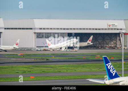 Airplane departing from Haneda Airport in Japan Stock Photo