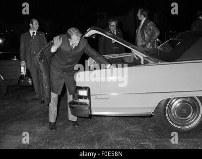 Plains, Georgia, USA. 8th Mar, 2014. 1976 Democratic nominee for President of the United States, Jimmy Carter on the campaign trail in the midwest. Carter fetches his luggage from a car trunk. Helping reinforce his reputation as an outsider and a common man, Carter refused to have others carry his bags. - To license this image, click on the shopping cart below © Ken Hawkins/ZUMA Wire/Alamy Live News Stock Photo