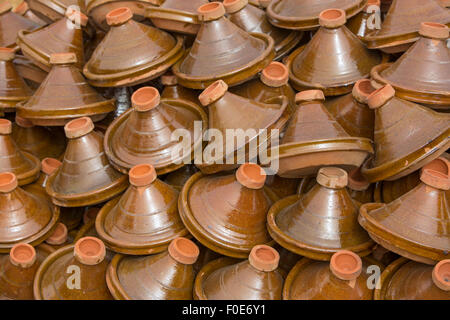 Selection of brown Moroccan tajines (traditional casserole dishes) found at the market Stock Photo