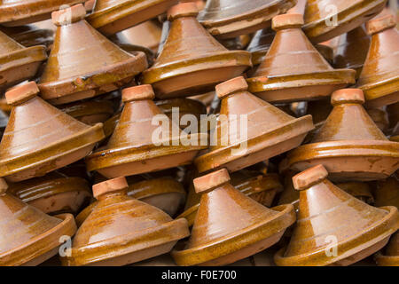 Selection of brown Moroccan tajines (traditional casserole dishes) found at the market Stock Photo