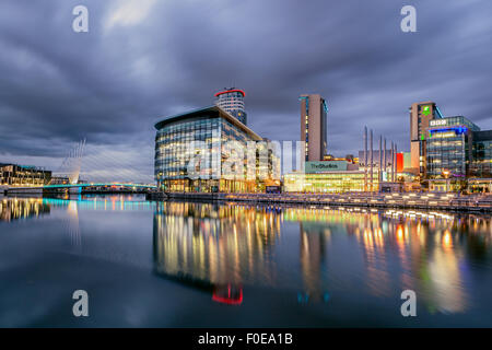 BBC media city at Salford quays , Manchester England. Panoramic view of modern buidings at twilight. Stock Photo