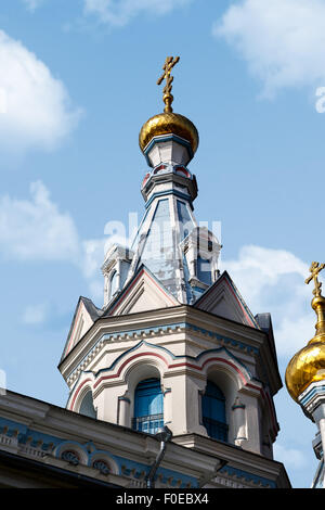 Close up view of Orthodox Ss Boris and Gleb Cathedral in Dougavpils, Latvia, on blue cloudy sky background. Stock Photo