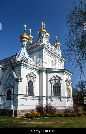 Side view of Orthodox Ss Boris and Gleb Cathedral in Dougavpils, Latvia, on blue sky background. Stock Photo