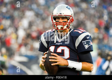 Foxborough, Massachusetts, USA. 13th August, 2015. New England Patriots quarterback Tom Brady (12) gets ready to take the field for the Patriots opening drive at an NFL pre-season game between the Green Bay Packers and the New England Patriots held at Gillette Stadium in Foxborough Massachusetts. The Packers defeated the Patriots 22-11 in regulation time. Eric Canha/CSM/Alamy Live News Stock Photo