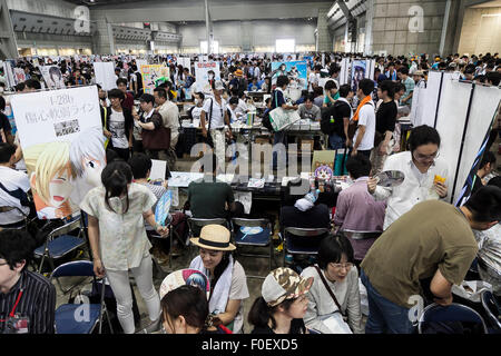 Tokyo, Japan. 14th August, 2015. Visitors gather at the ''Comic Market 88 Summer 2015'' exhibition at Tokyo Big Sight on August 14, 2015, Tokyo, Japan. Thousands of manga and anime fans attended the first day of the Comic Market 88 (Comiket) at Tokyo Big Sight. The Comic Market was established in 1975 to allow fans and artists to interact and focuses on manga, anime, gaming and cosplay. The exhibition is held from August 14th to 16th and Comiket organisers expect more than 500,000 visitors to attend. Credit:  Rodrigo Reyes Marin/AFLO/Alamy Live News Stock Photo