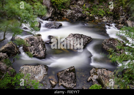 Afon Glaslyn flowing through the Aberglaslyn Pass near Beddgelert in the Snowdonia National Park. Stock Photo