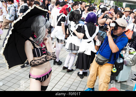 Tokyo, Japan. 14th August, 2015. A cosplayer poses for a picture during the ''Comic Market 88 Summer 2015'' exhibition at Tokyo Big Sight on August 14, 2015, Tokyo, Japan. Thousands of manga and anime fans attended the first day of the Comic Market 88 (Comiket) at Tokyo Big Sight. The Comic Market was established in 1975 to allow fans and artists to interact and focuses on manga, anime, gaming and cosplay. The exhibition is held from August 14th to 16th and Comiket organisers expect more than 500,000 visitors to attend. Credit:  Rodrigo Reyes Marin/AFLO/Alamy Live News Stock Photo