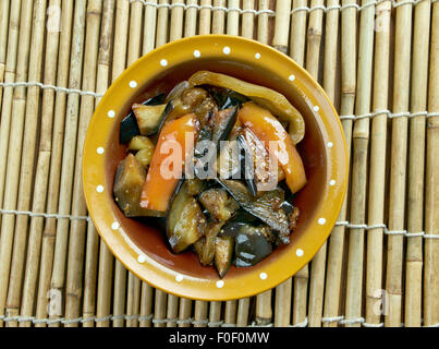 Di san xian -  Chinese dish made of stir-fried potatoes, aubergine (egg-plant) and sweet peppers Stock Photo