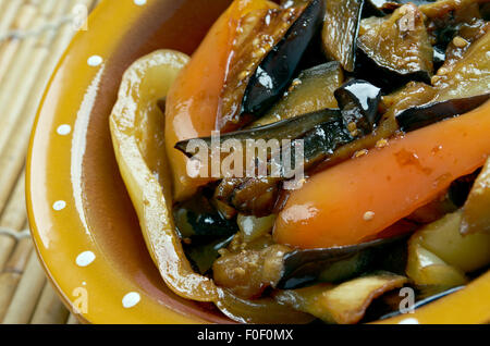 Di san xian -  Chinese dish made of stir-fried potatoes, aubergine (egg-plant) and sweet peppers Stock Photo