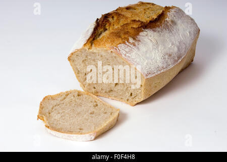 Sourdough bread slicing Stock Photo by grafvision