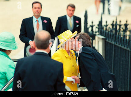 The Queen attends the wedding of Timothy Knatchbull and Isabella Norman .. here seen being greated by Timothy at the doors of Winchester Cathedral Stock Photo