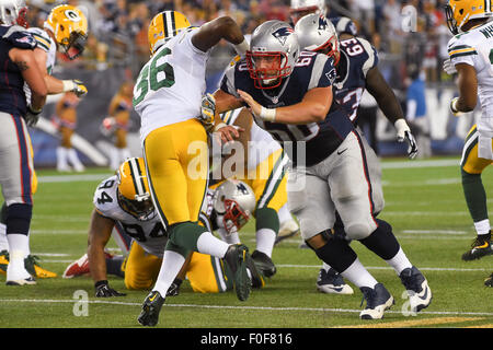 August 13, 2015: New England Patriots center David Andrews (60) blocks Green Bay Packers cornerback Ladarius Gunter (36) during the NFL pre-season game between the Green Bay Packers and the New England Patriots held at Gillette Stadium in Foxborough Massachusetts. The Packers defeated the Patriots 22-11 in regulation time. Eric Canha/CSM Stock Photo