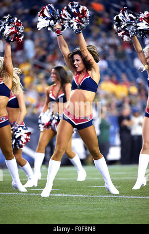 August 13, 2015: Patriots cheerleaders entertain fans during a break in the action at the NFL pre-season game between the Green Bay Packers and the New England Patriots held at Gillette Stadium in Foxborough Massachusetts. The Packers defeated the Patriots 22-11 in regulation time. Eric Canha/CSM Stock Photo