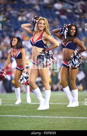 August 13, 2015: Patriots cheerleaders entertain fans during a break in the action at the NFL pre-season game between the Green Bay Packers and the New England Patriots held at Gillette Stadium in Foxborough Massachusetts. The Packers defeated the Patriots 22-11 in regulation time. Eric Canha/CSM Stock Photo